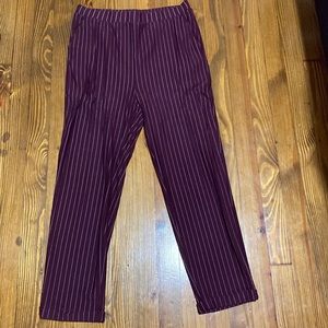 Maroon pin stripe pants. Stretchy material.